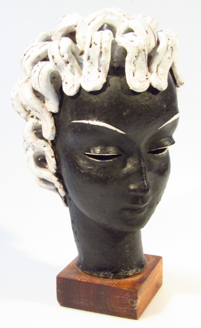 Appraisal: A modern Studio pottery sculpture of a lady head profile