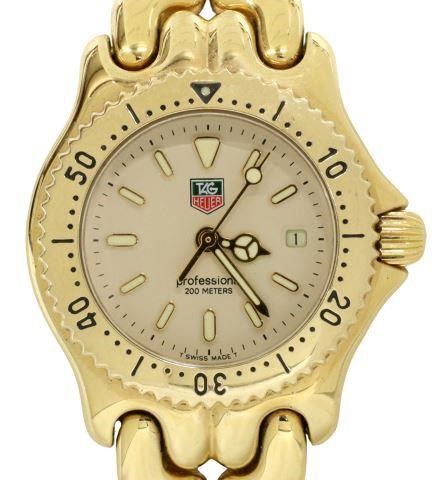 Appraisal: Lady's Tag Heuer gold-plated stainless steel wristwatch model WG champagne