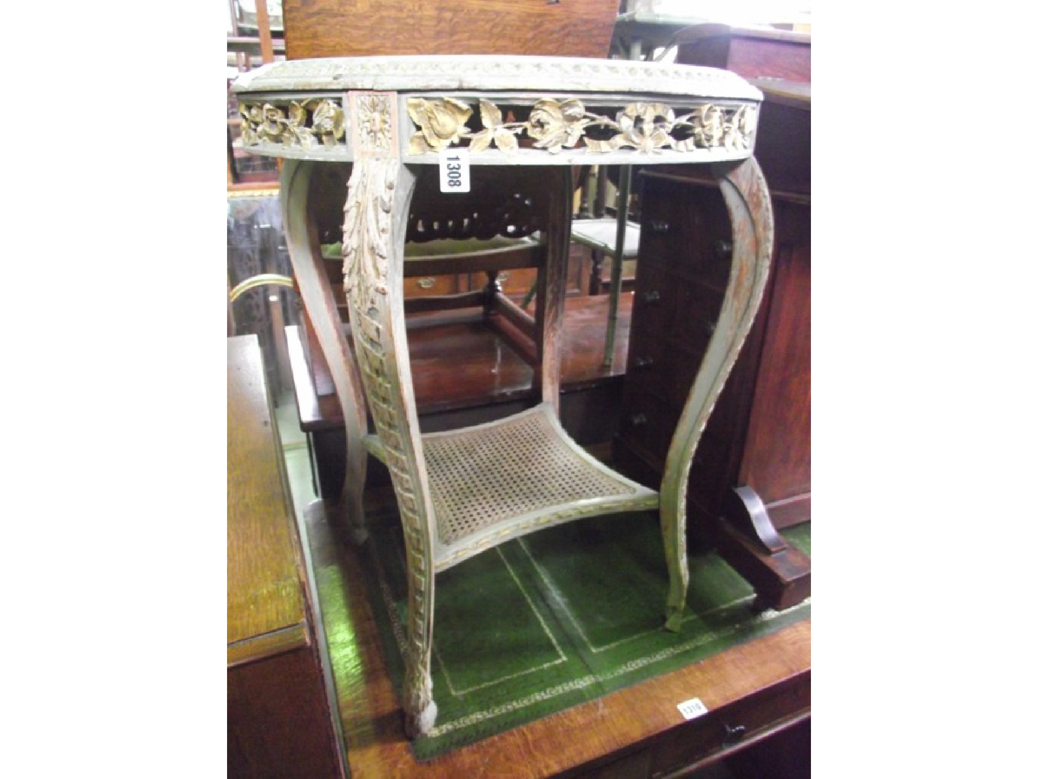 Appraisal: A two tier occasional table the circular top with painted