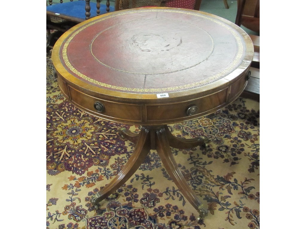 Appraisal: Revolving drum shaped table with leather top