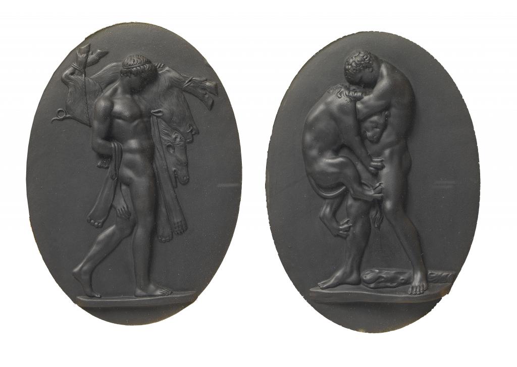 Appraisal: A PAIR OF WEDGWOOD BLACK BASALT OVAL BAS RELIEFS OF