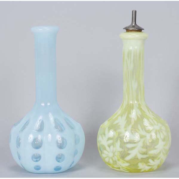 Appraisal: Two glass opalescent melon shaped barber bottles blue coin dot