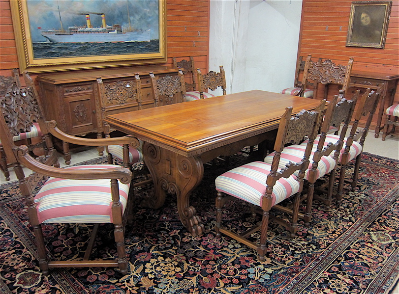 Appraisal: FIFTEEN-PIECE CARVED WALNUT DINING ROOM FURNITURE SET Italian Baroque style