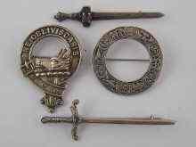 Appraisal: Four Scottish brooches three being silver