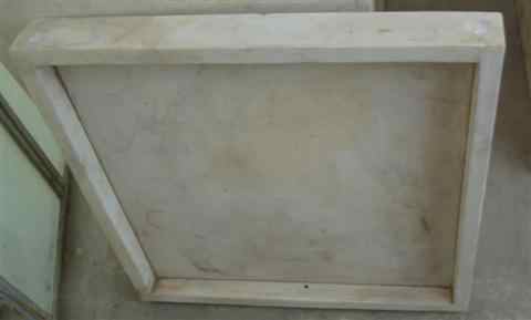 Appraisal: TWO LIMESTONE TRAYS each of square form with a raised