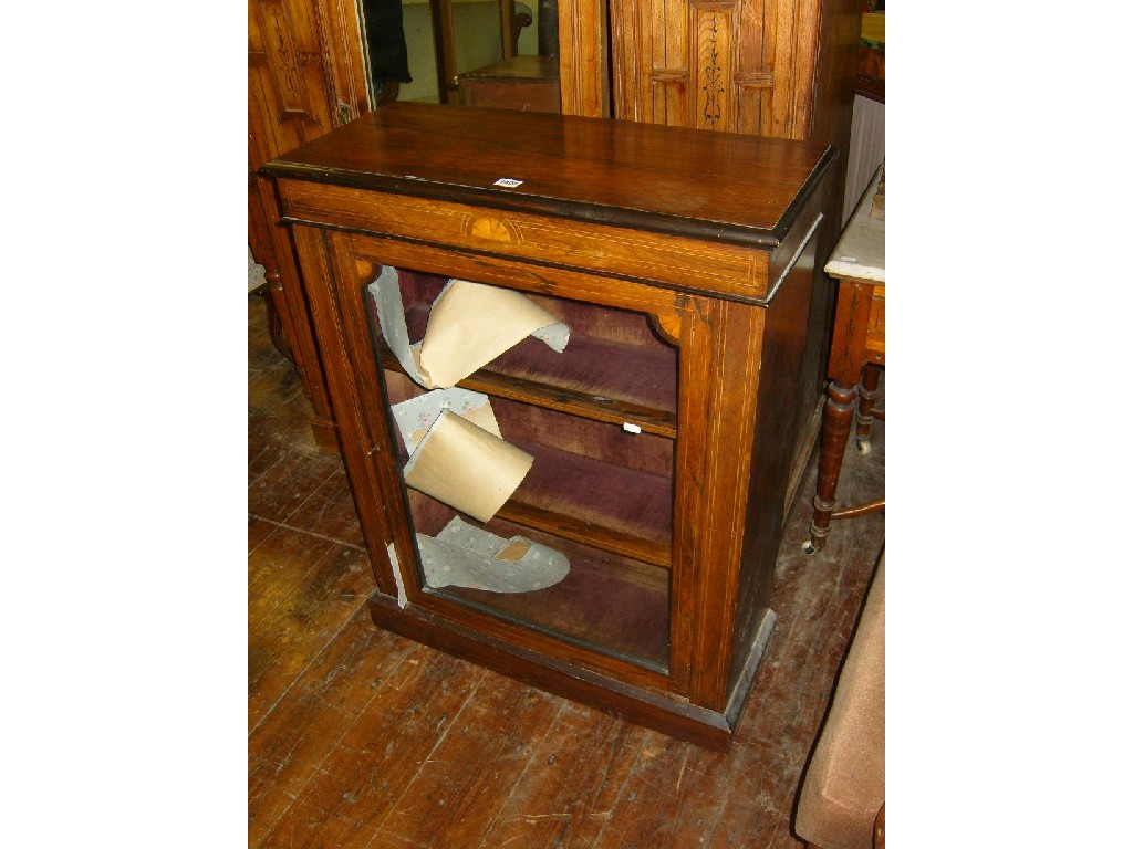 Appraisal: A Victorian rosewood pier cabinet enclosed by glazed panelled door