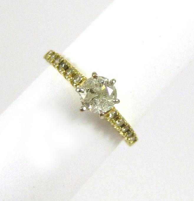 Appraisal: DIAMOND AND TEN KARAT GOLD RING with six round-cut diamonds