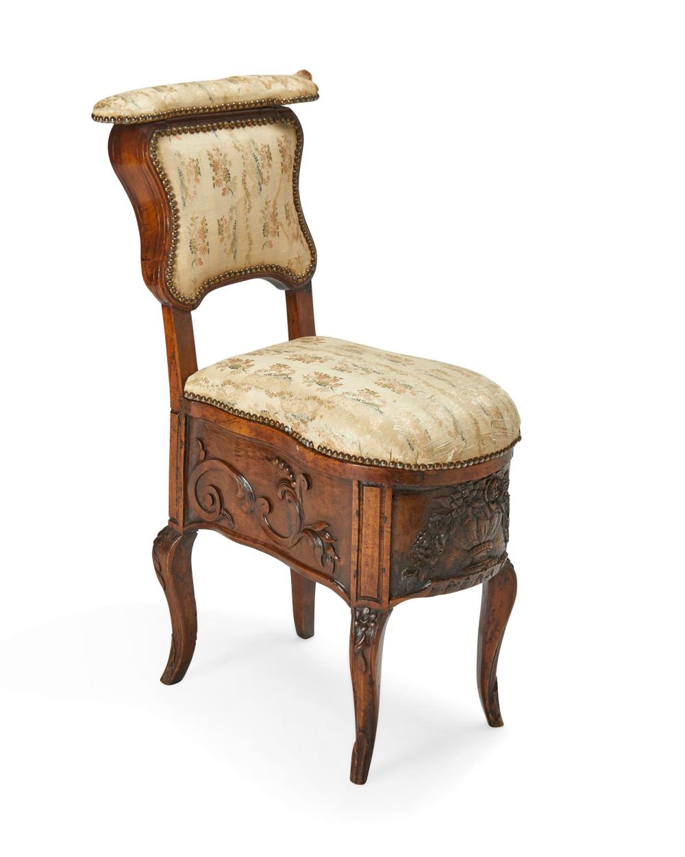 Appraisal: A FRENCH CARVED WOOD COMMODE CHAIRA French carved wood commode