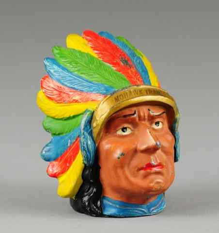 Appraisal: INDIAN BUST LEAD STILL BANK Germany depicted wearing colorful headdress