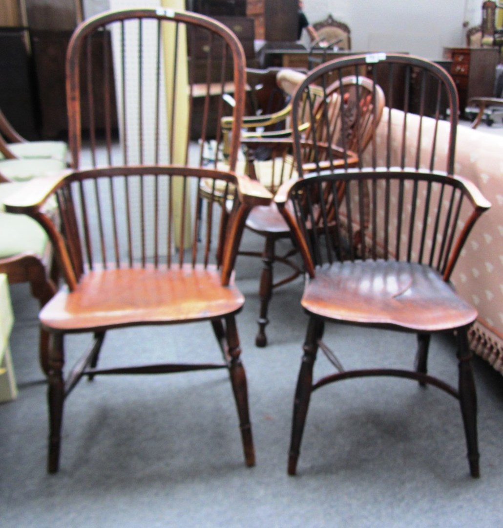 Appraisal: A George III yew and elm stick back Windsor chair