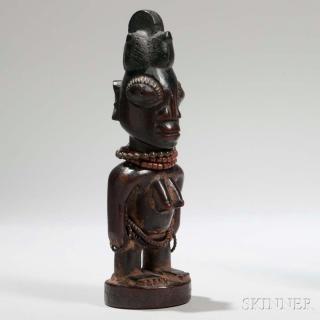 Appraisal: Yoruba Ibeji Doll the female figure with large facial features