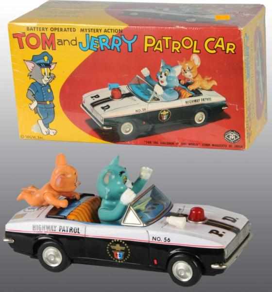 Appraisal: Tin Tom Jerry Highway Patrol Car Battery-Op Toy Description Japanese