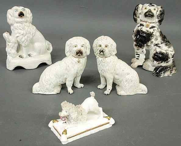 Appraisal: Pair of th c Staffordshire white dogs h and three