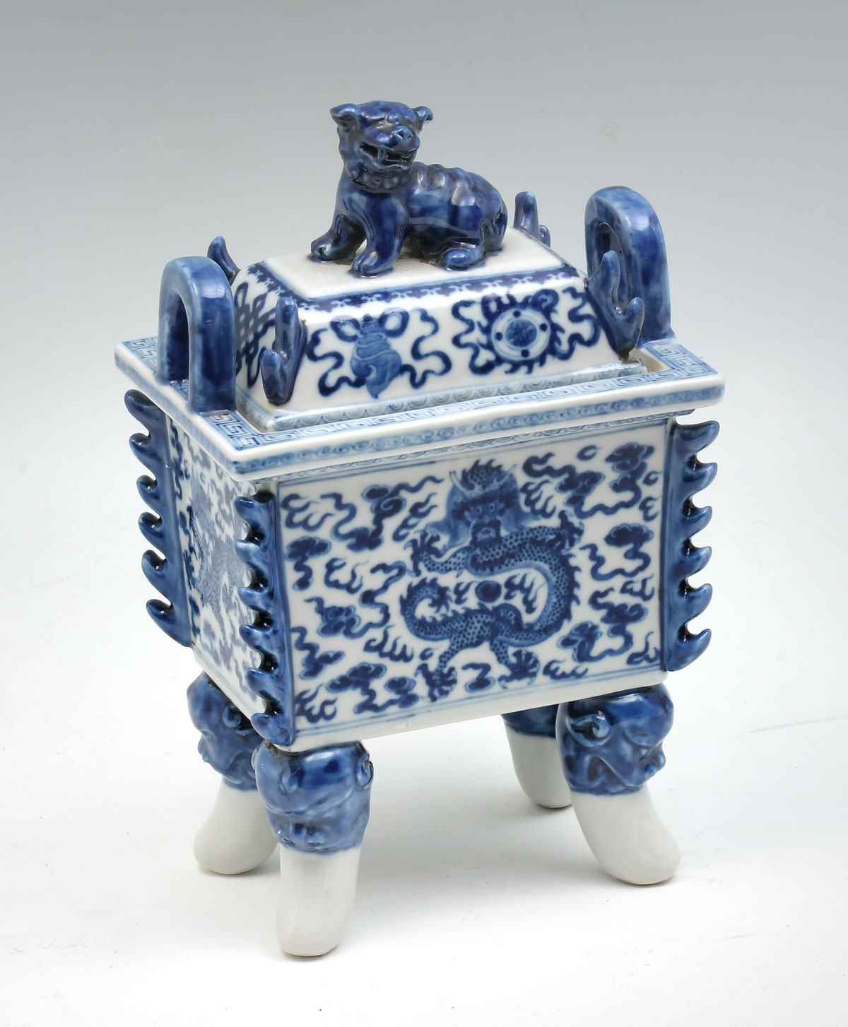 Appraisal: BLUE WHITE CHINESE PORCELAIN CENSOR Surmounting Foo Dog lid with