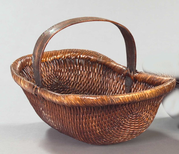 Appraisal: Large Provincial Woven Reed Basket with arched bentwood handle the