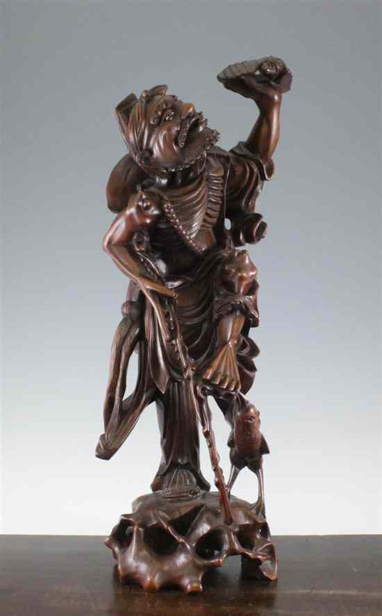 Appraisal: A large Chinese hardwood figure of a luohan first half