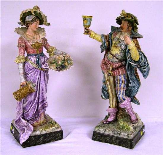 Appraisal: Pair of Continental ceramic figurines a troubadour holding a chalice