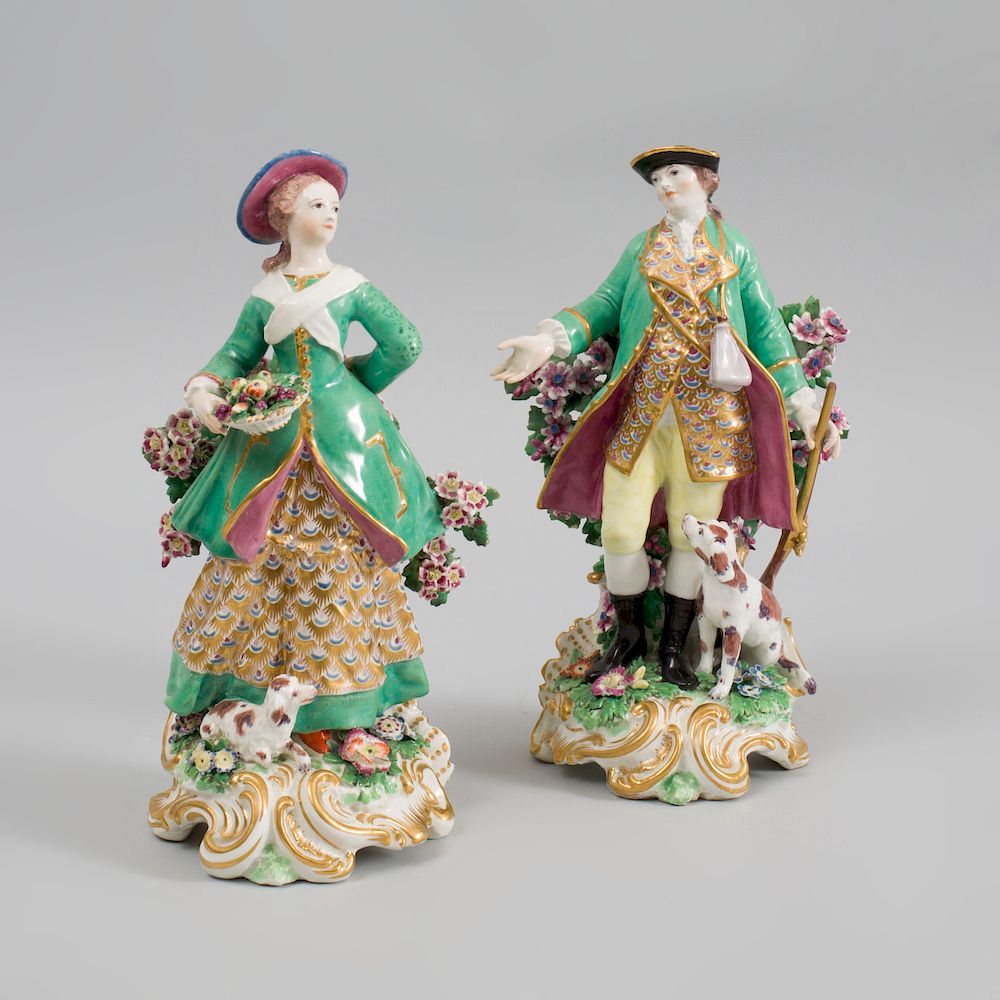 Appraisal: Pair of Chelsea Porcelain Figures of a Huntsman and Companion