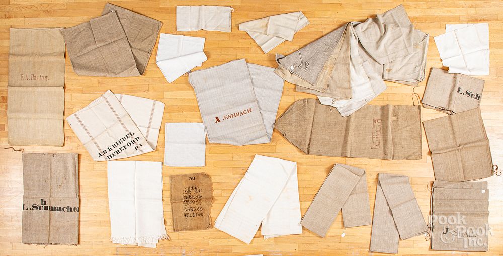 Appraisal: Early linen yardage and grain feed bags Early linen yardage