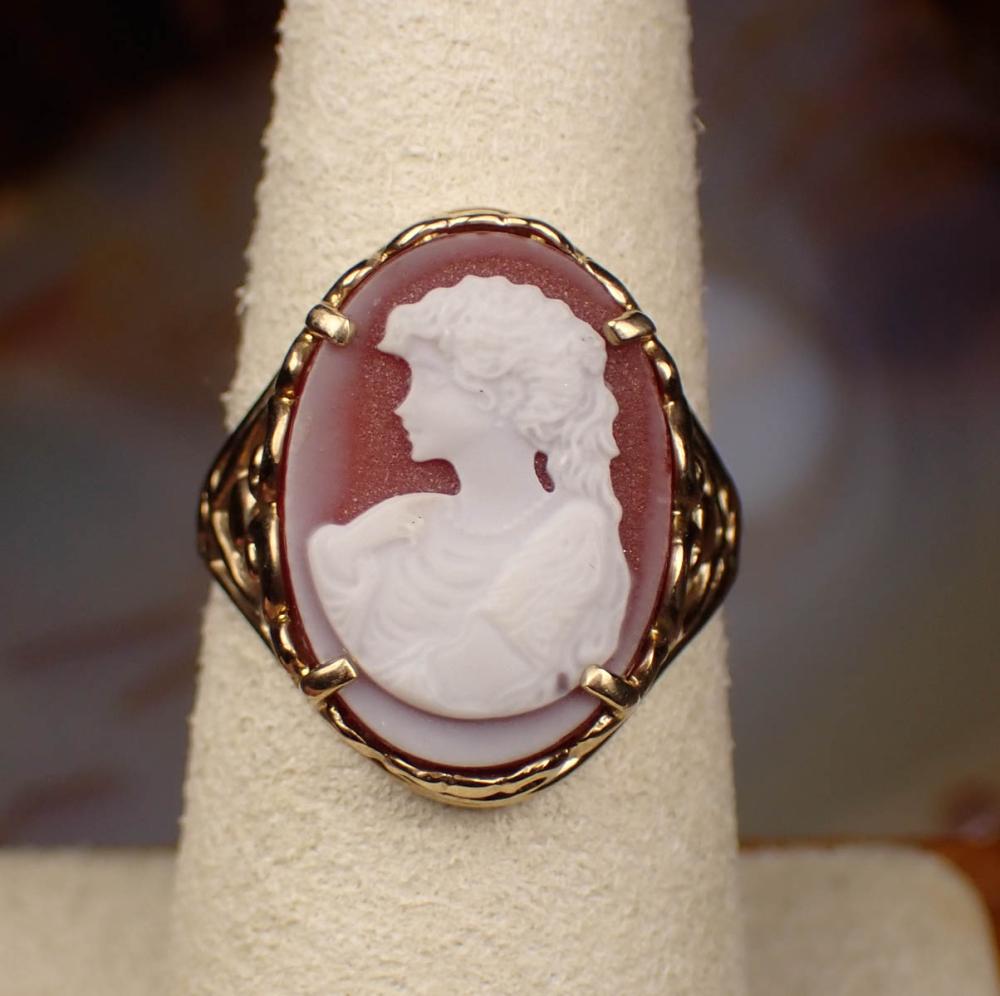 Appraisal: CAMEO AND YELLOW GOLD OPEN SCROLL RING The k gold