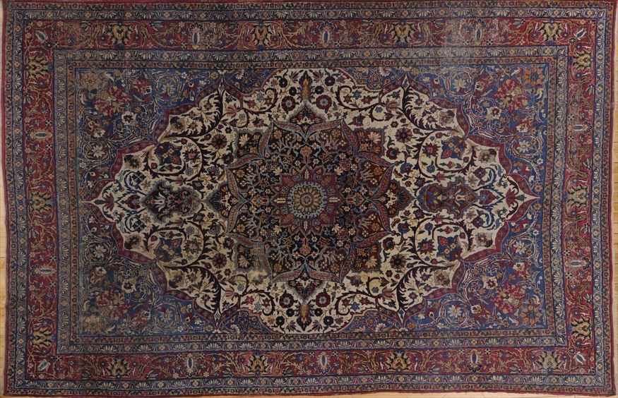 Appraisal: MESHED MEDALLION CARPET The tan sky blue and grape medallion