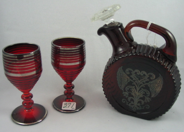 Appraisal: A THREE PIECE STERLING OVERLAY RUBY GLASS DRINKS SET the