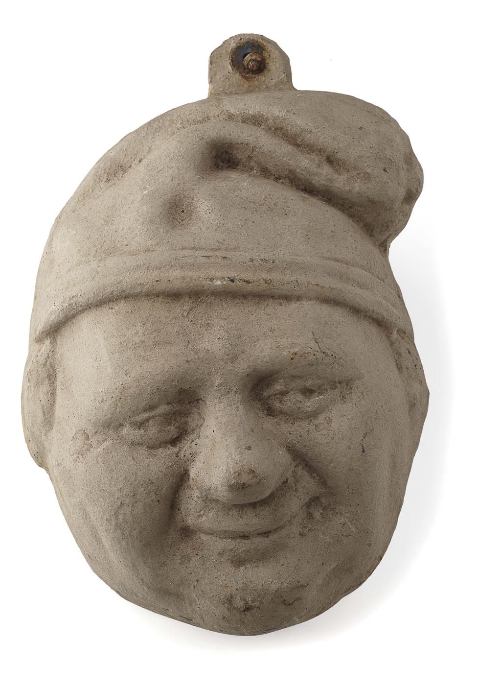 Appraisal: A SCOTTISH CAST IRON WALL MASK OF 'SOUTER JOHNNIE' LATE