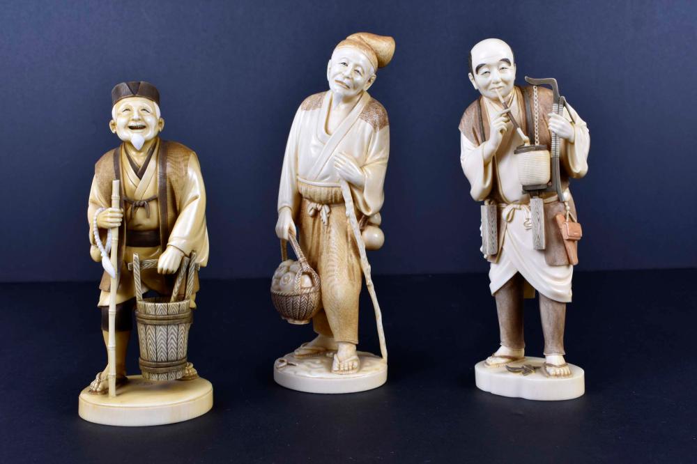 Appraisal: THREE JAPANESE OKIMONO OF A LORD AND TWO PEASANTSMeiji Period