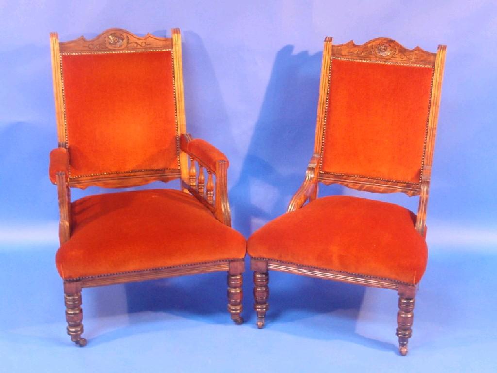 Appraisal: A Victorian walnut framed gents armchair and matching nursing chair