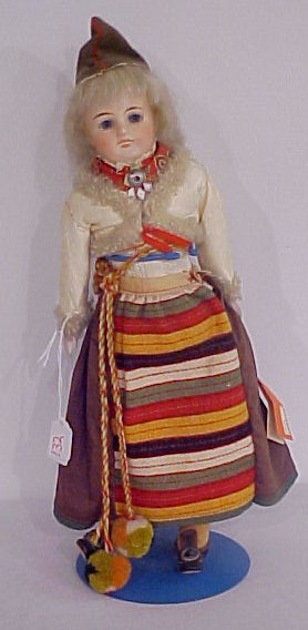 Appraisal: Doll bisque shouldered on cloth body with bisque hands in