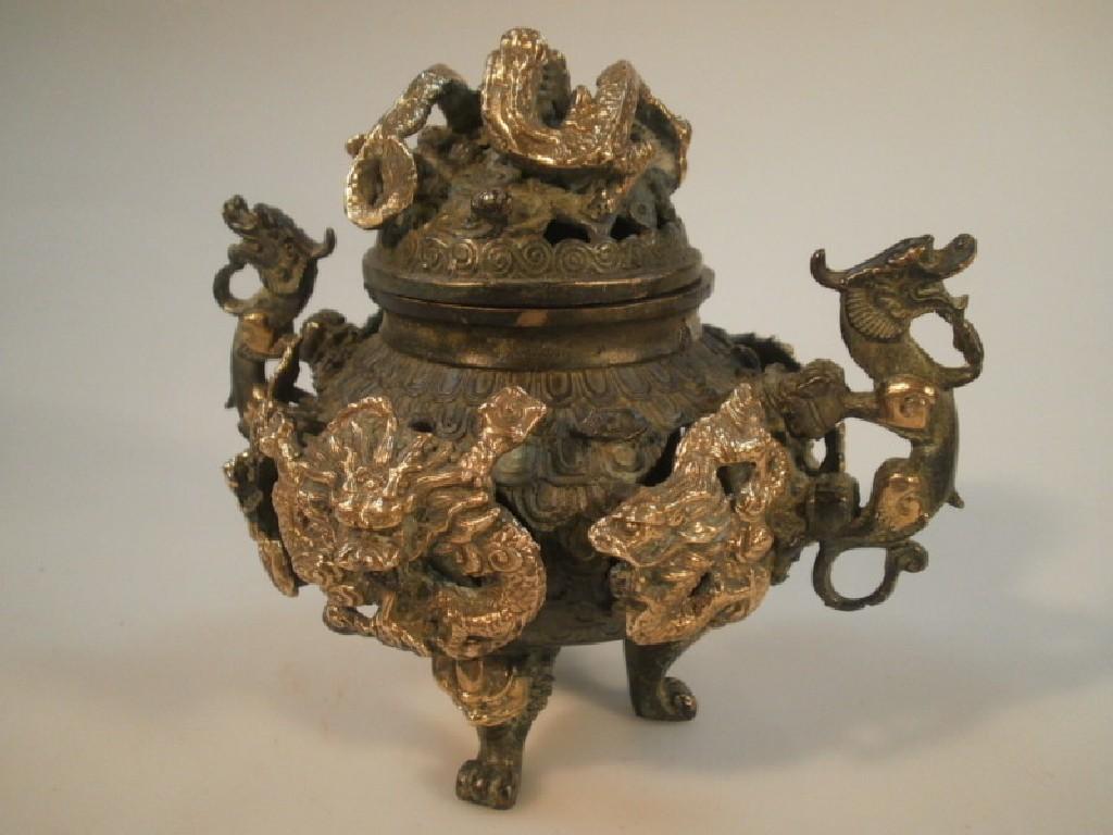 Appraisal: A Chinese bronze and gilt incense burner