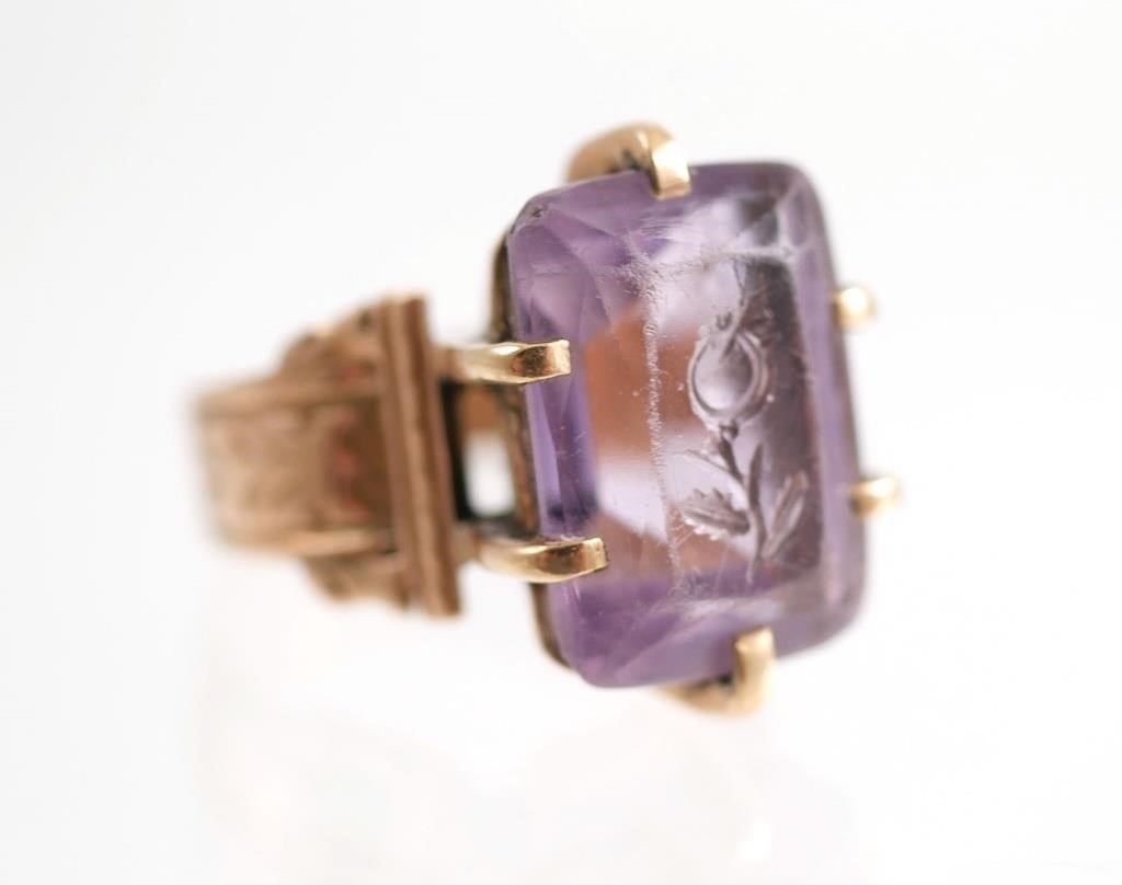 Appraisal: ANTIQUE K GOLD INTAGLIO AMETHYST RINGOrnate k rose gold ring