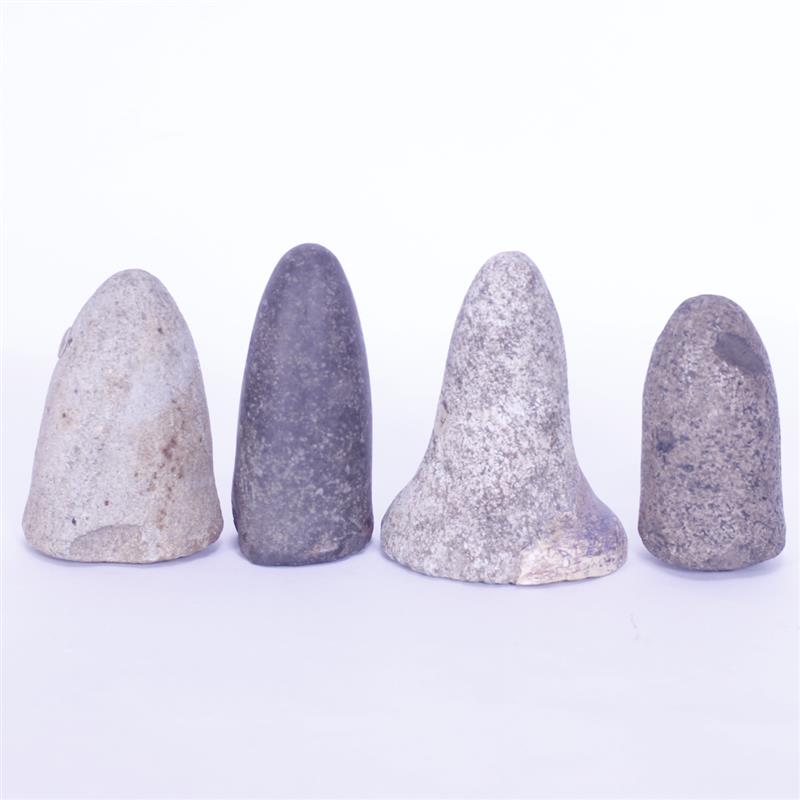 Appraisal: Four Hardstone Pestles One bell has restoration on bottom Longest