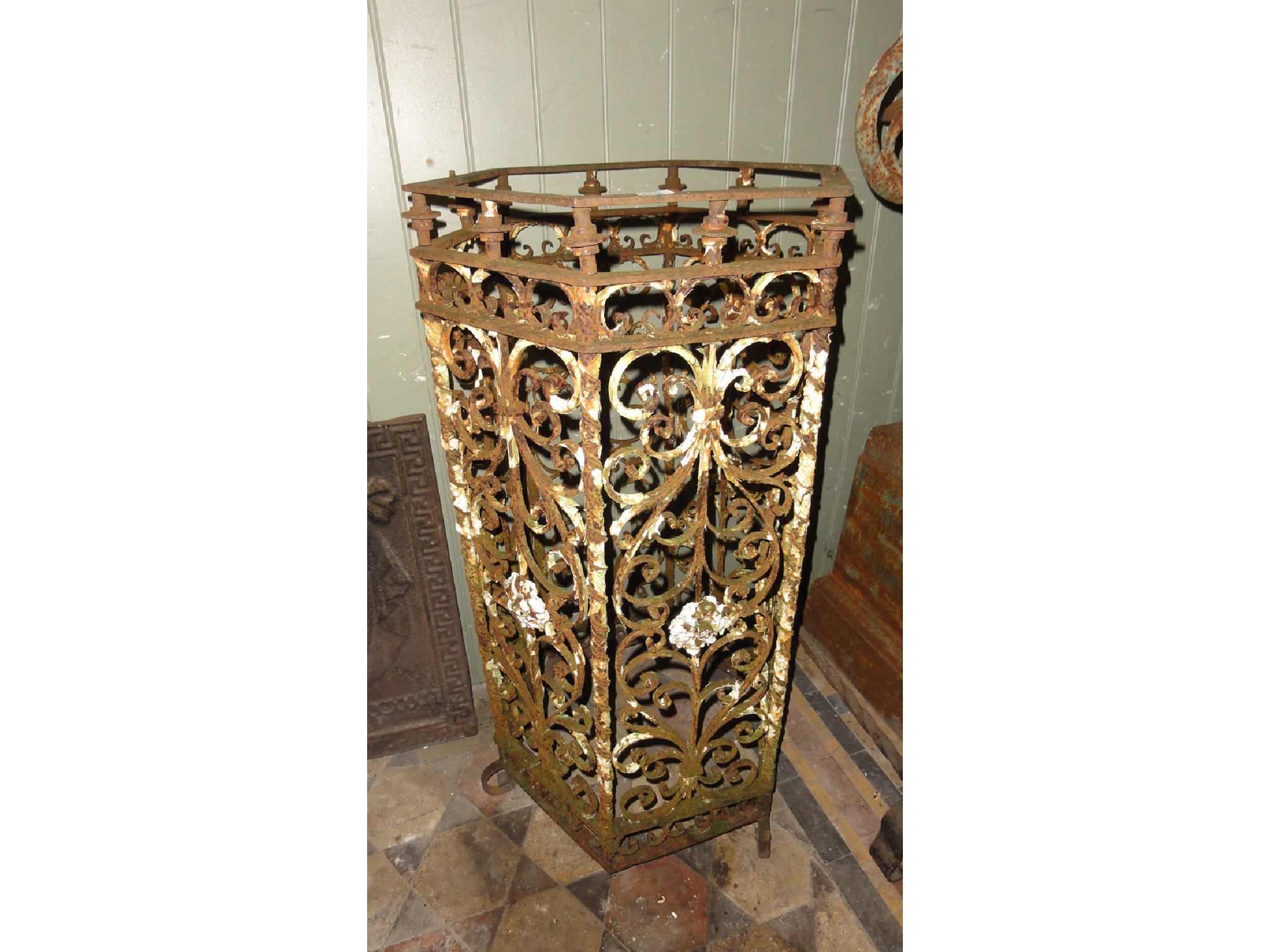 Appraisal: A pair of th century wrought and cast iron ornamental