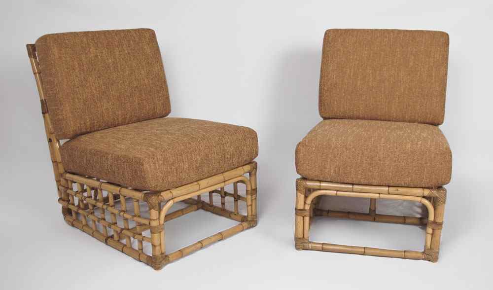 Appraisal: PAIR MID CENTURY LEATHER WRAPPED RATTAN CHAIRS Freshly upholstered cushion