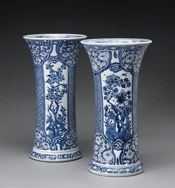 Appraisal: A pair of blue and white porcelain beaker vases Kangxi