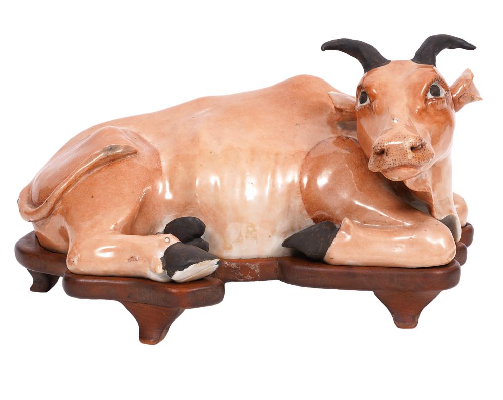 Appraisal: ANTIQUE CHINESE CERAMIC WATER BUFFALO ON WOOD BASEAntique Chinese water