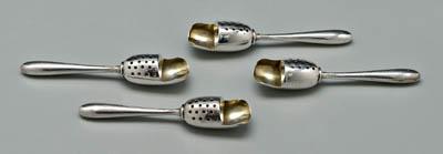 Appraisal: Four sterling sifters oval hollow handles covered scoops with pierced