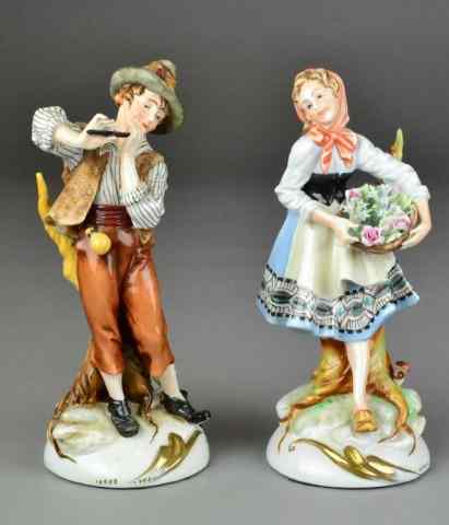 Appraisal: PAIR OF PEASANT FIGURINES - CAPODIMONTE STYLEIncluding shepherd playing flute