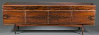 Appraisal: Mid Century rosewood buffet credenza A Mid-Century Modern rosewood veneered