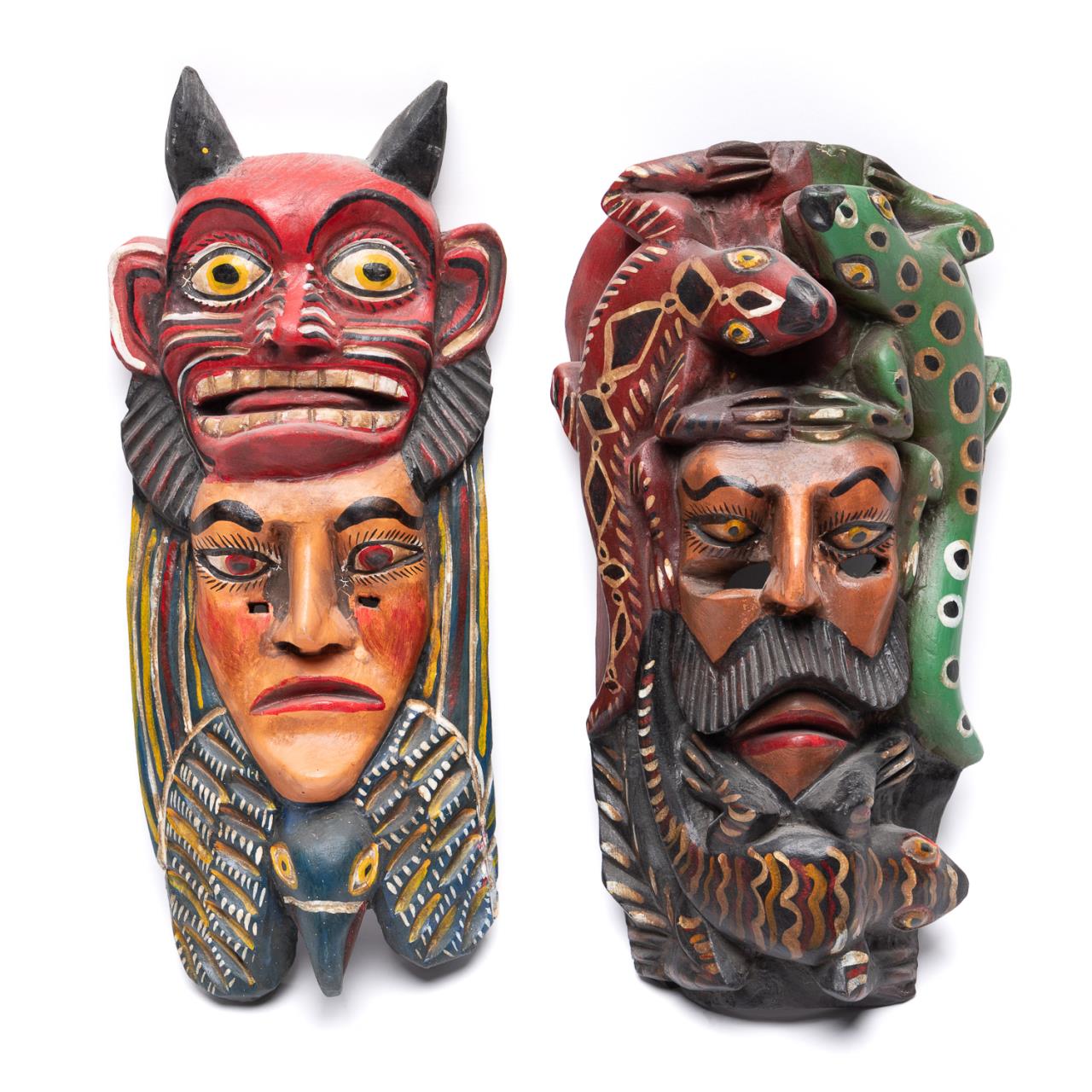 Appraisal: TWO MEXICAN CARVED WOOD AND PIGMENT MASKS Two Mexican carved