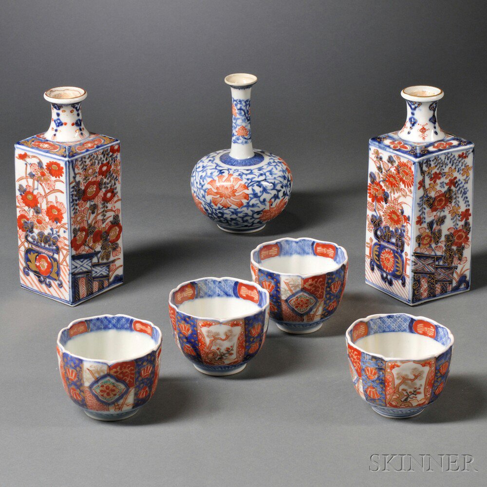 Appraisal: Seven Imari Porcelain Items Japan including two four-sided bottles with