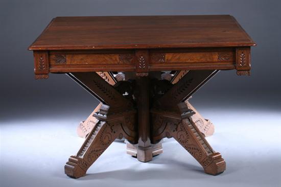 Appraisal: EASTLAKE CARVED WALNUT SQUARE DINING TABLE Circa with five leaves