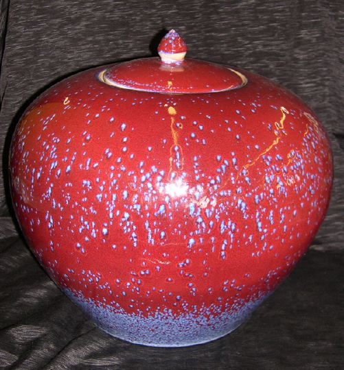 Appraisal: Large Chinese Sand-de-Boeuf Flambe-Glazed Porcelain Pyriform Covered Vase in the