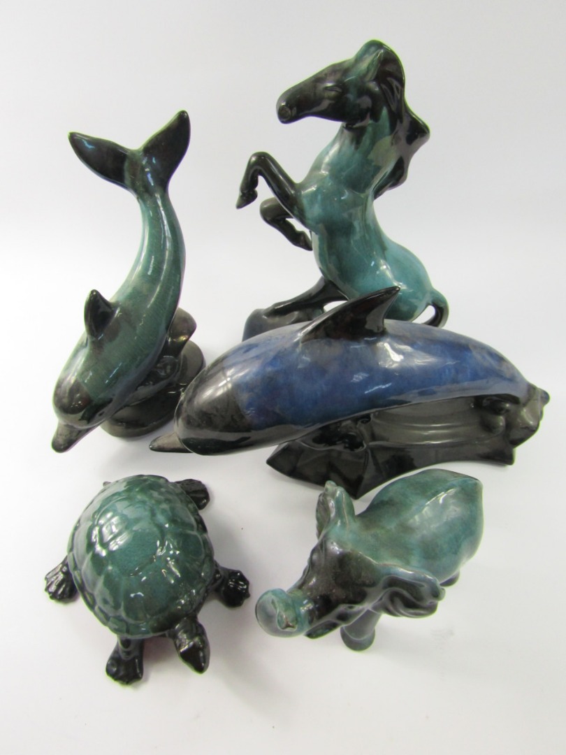 Appraisal: A collection of Blue Mountain Pottery dolphin figures and others