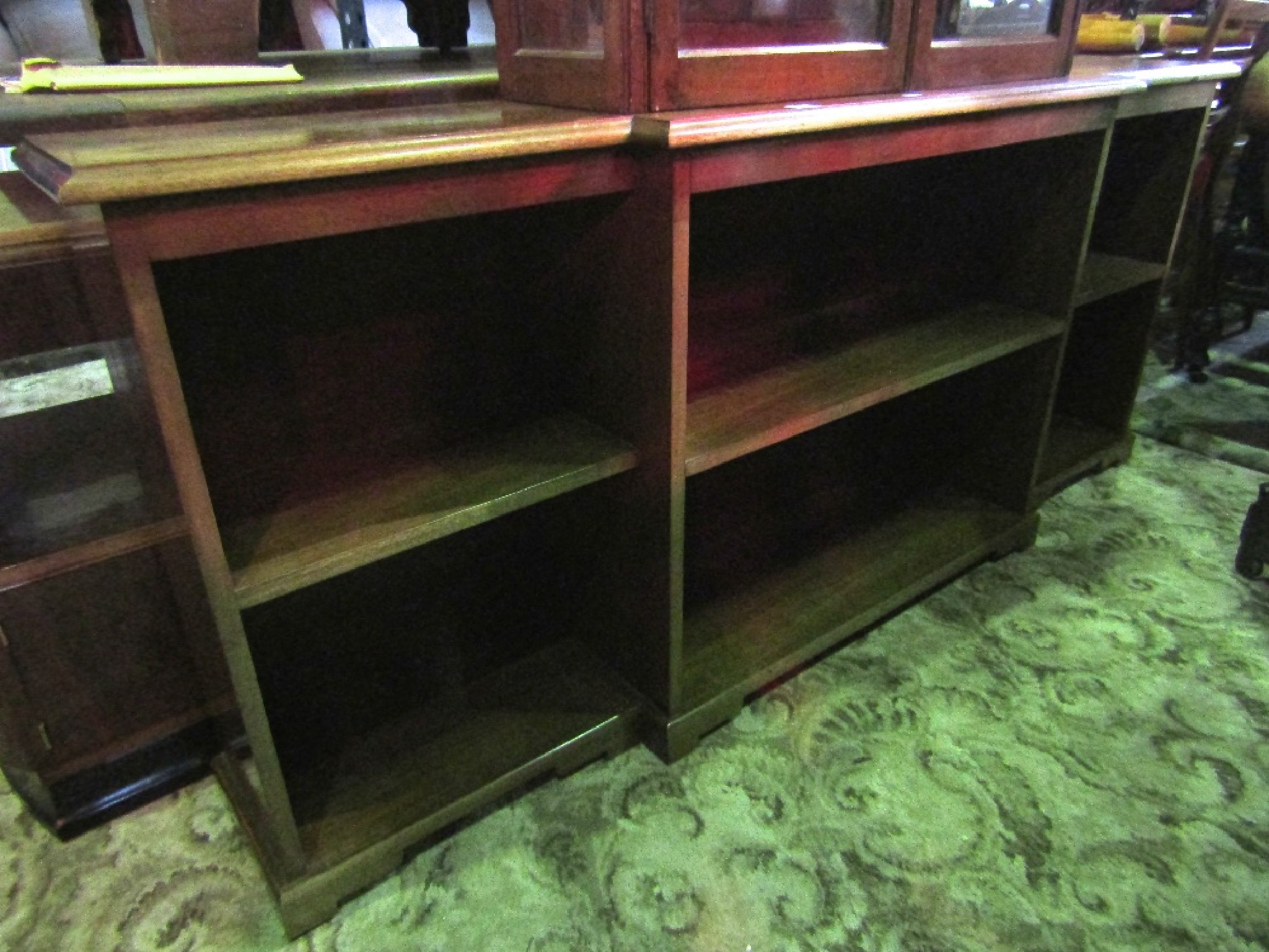 Appraisal: A Georgian style dwarf freestanding shallow breakfront open bookcase with