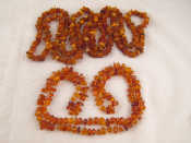 Appraisal: A mixed lot comprising two amber necklaces one approx cm