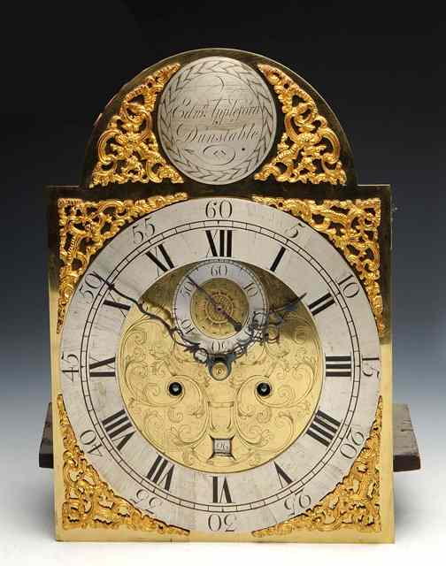 Appraisal: AN EIGHT DAY LONG CASE CLOCK the break arch brass