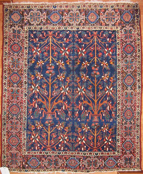 Appraisal: AFSHAR antique Blue central field with plant motifs brown trim