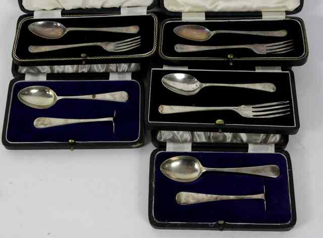 Appraisal: Three cased silver christening sets th Century each comprising spoon